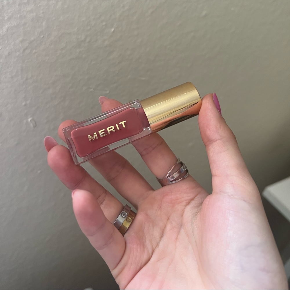Merit slick lip oil in Pink beet